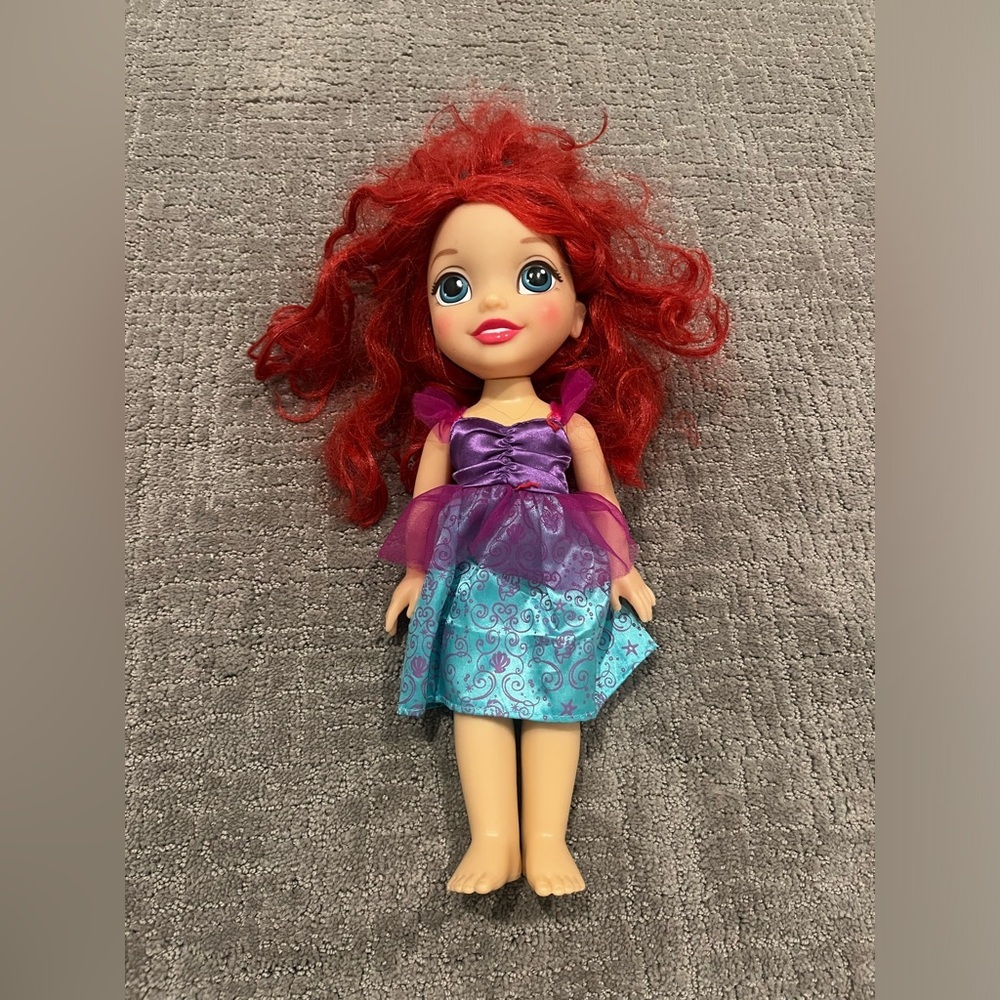 Red-Haired Doll with Purple Dress